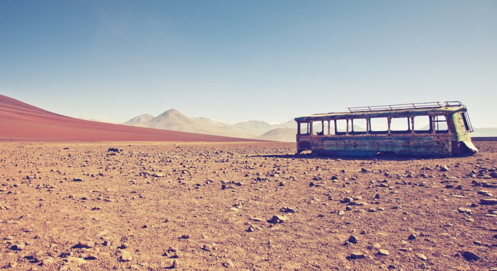 The Bolivian high plateau offers vast natural open spaces filled with beauty due to the absence of humans. Yet the presence of this empty rusted bus somehow melts into this dramatic scenery.